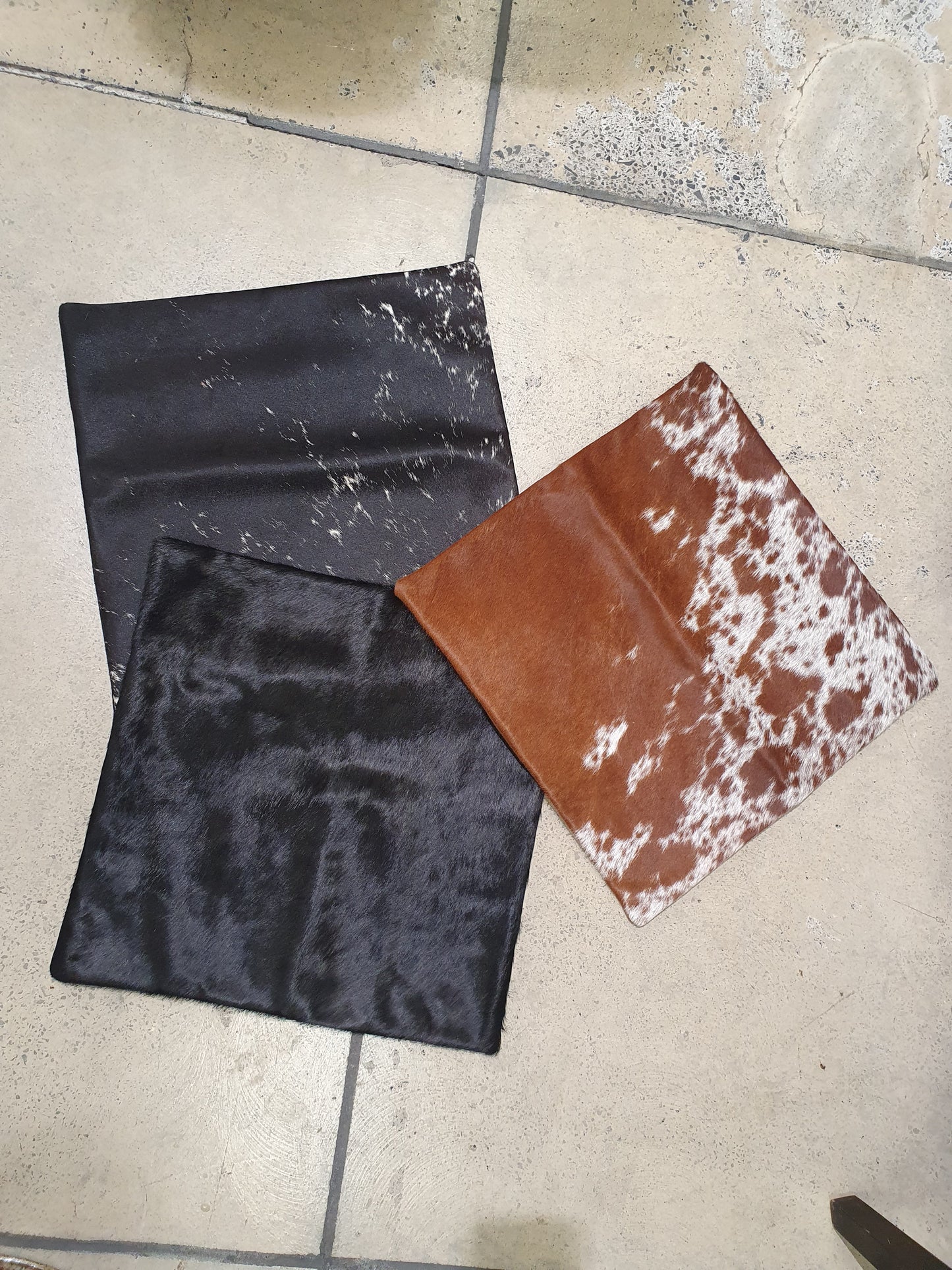 The Design Edge single panel cowhide pillow cover