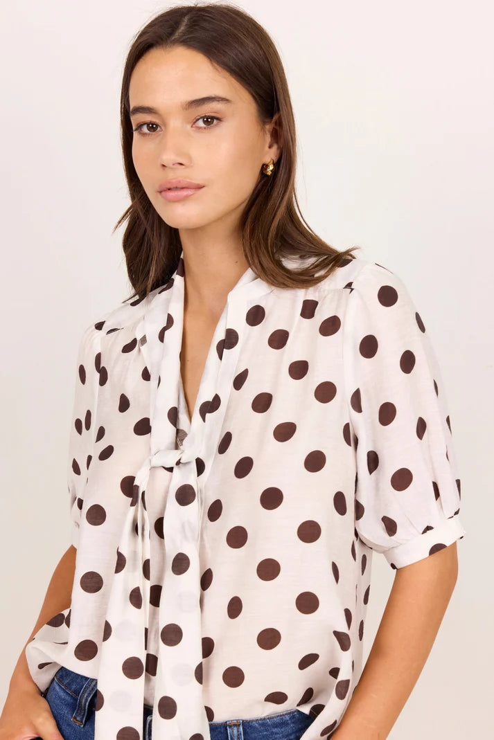 Stories Be Told Providence Chocolate Polka Tie Neck Short Sleeve Top
